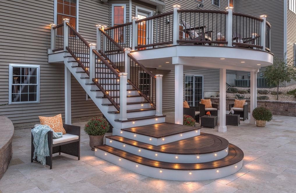 This image shows a deck with all of the lighting options in use showing how the lights add more depth to an outdoor space like a deck.