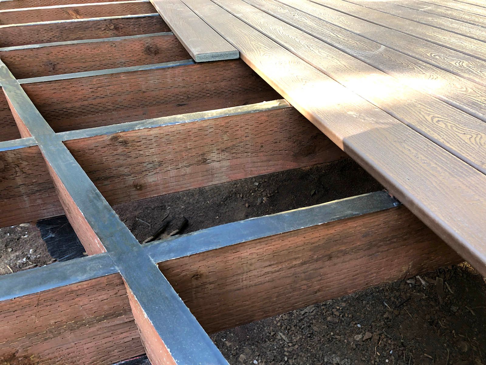 This is an image of Trex Protect Joist tape being used and showing the deck boards laying on top of some of the sections.