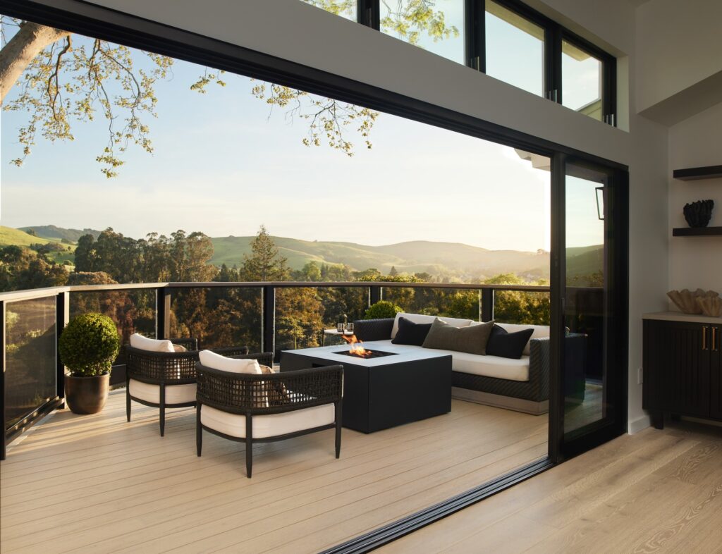 Scenic balcony with TimberTech Reserve Reclaimed Chestnut composite decking, offering a rustic yet refined appearance.