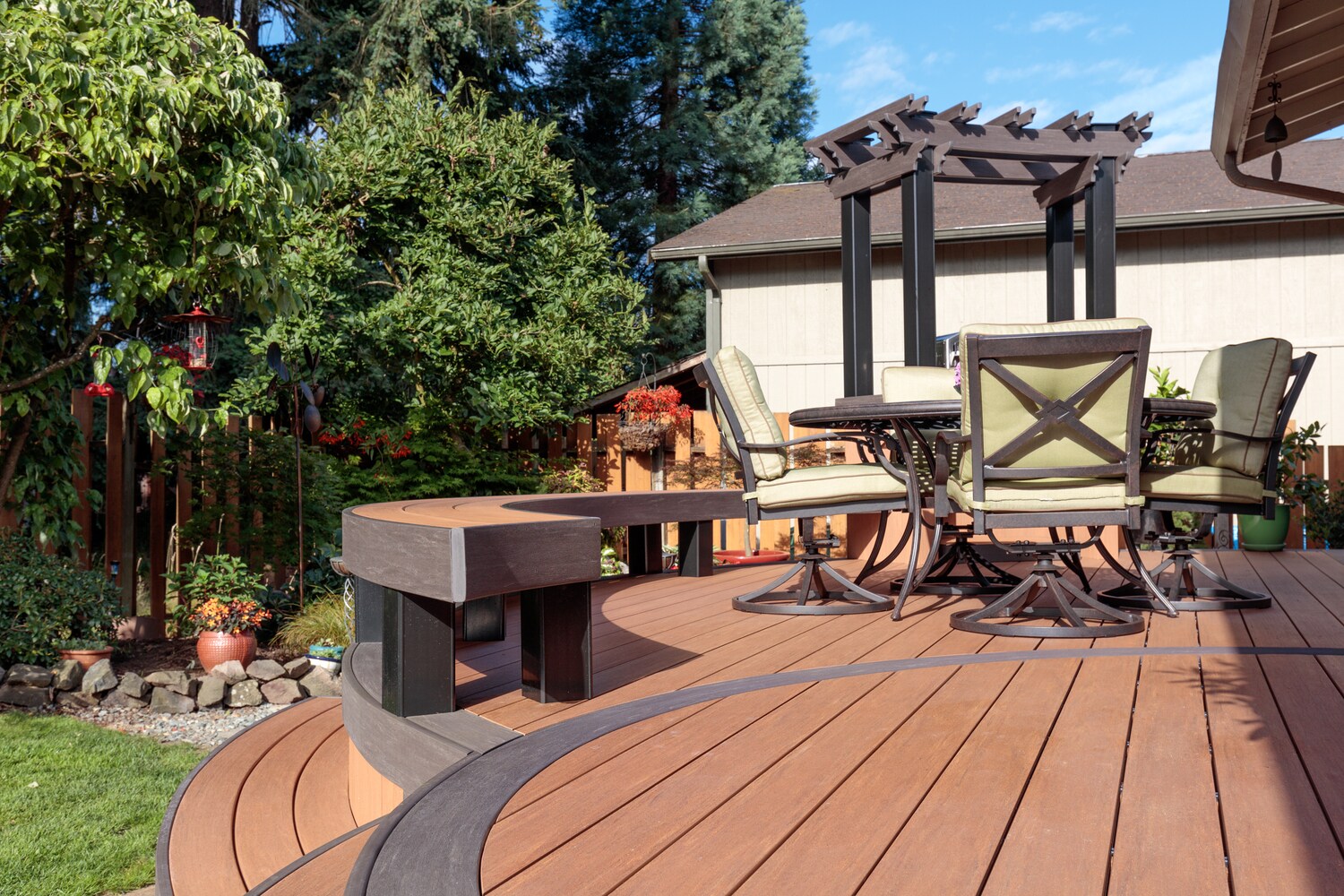 Close-up view of TimberTech Vintage Cypress PVC decking, showcasing tropical brown hues and light-dark mineral streaks that replicate the elegance of exotic ipe hardwood.
