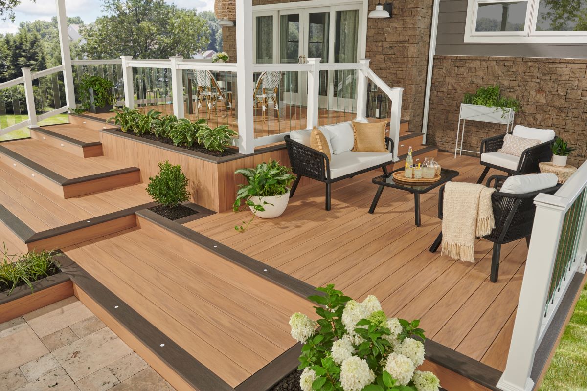 Contemporary backyard deck with Wolf PVC decking, illustrating deck cost based on durable, low-maintenance materials