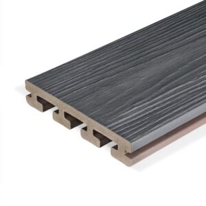 Eva-Last Infinity IS grooved-edge decking board in Concrete Grey, featuring a slim profile with realistic woodgrain texture and a rich charcoal hue.