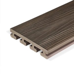 Close-up of Eva-Last Infinity IS Tiger Cove grooved deck board featuring a rich brown base with textured woodgrain and co-extruded bamboo composite core.