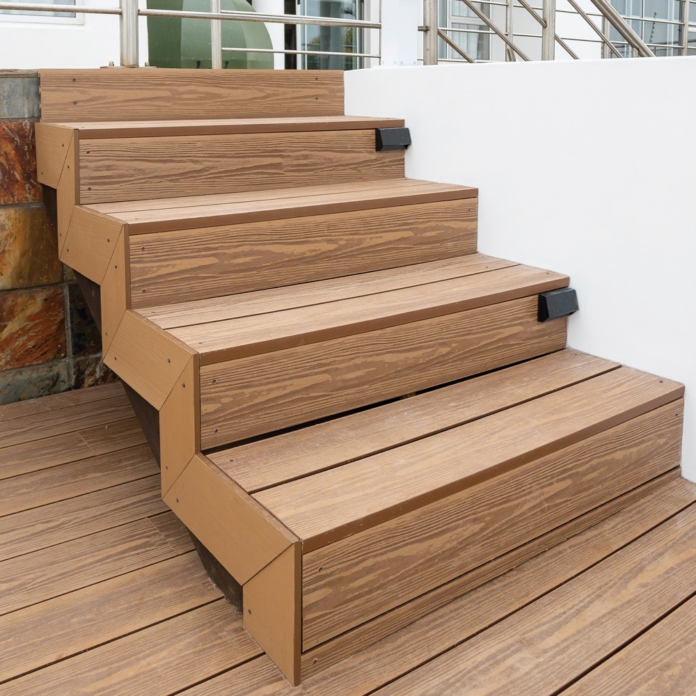 Eva-Last Eva-Tech IS Savanna dual tone decking used for a staircase installation with matching fascia and clean screw lines.
