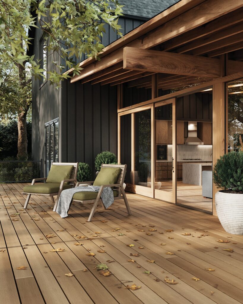 Fiberon Composite Decking - ArmorGuard Collection in Aspen Gray color, showcasing a stylish deck with modern furniture, white railings, and a serene outdoor.