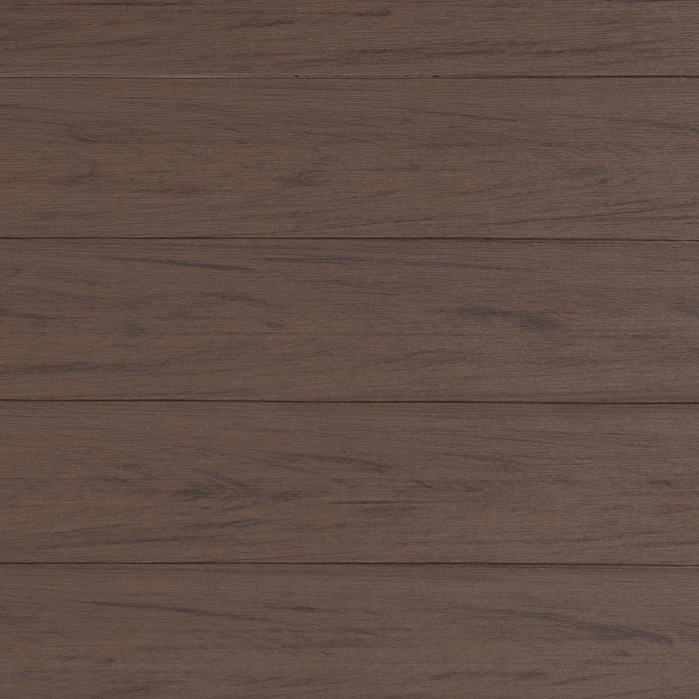 Close-up of Deckorators Porch Flooring in Chicory - a warm, medium brown tone with subtle grain patterns for a natural wood look.