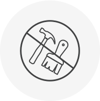 Minimalist icon of a hammer and paintbrush crossed out, symbolizing the low-maintenance benefits of Deckorators Vault decking.