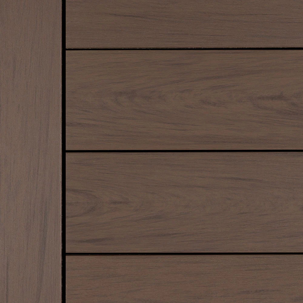 Deckorators Voyage decking in Khaya – rich, chocolate brown color with fine, subtle grain detailing for a deep, elegant look.
