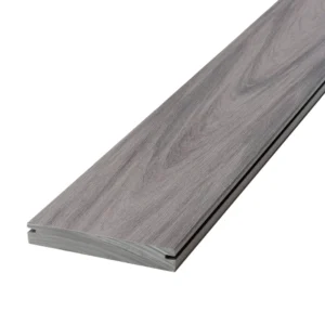 Close-up of a Deckorators Vault Dusk grooved-edge composite deck board featuring soft gray woodgrain texture and a clean, smooth profile.