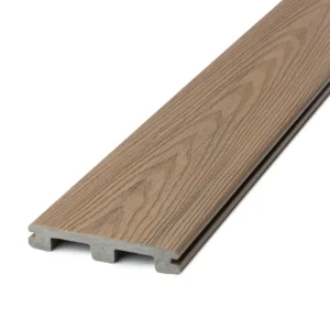 Close-up of the Deckorators Venture grooved-edge deck board in Sandbar, featuring a warm medium brown tone and a pronounced wood grain texture for a natural, classic look with the strength of composite construction.