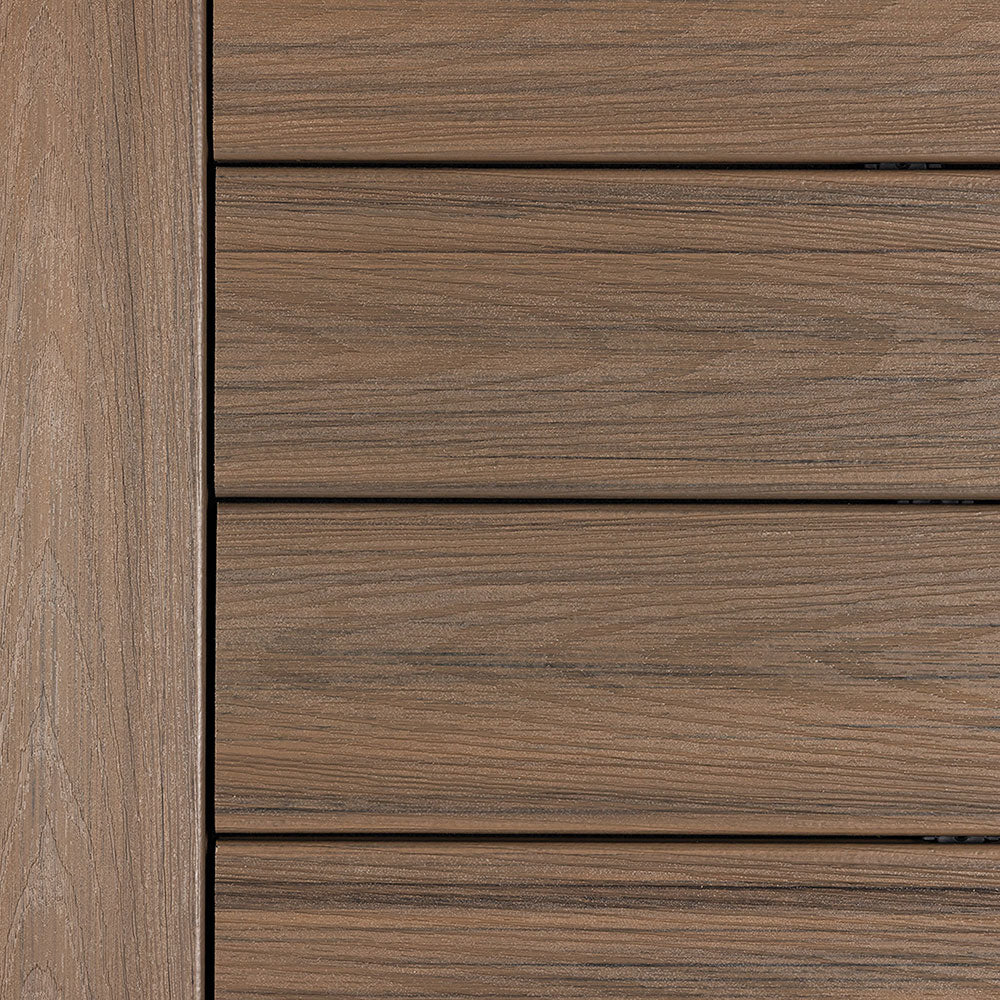 Deckorators Vista decking in Dunewood color - warm brown tones with realistic wood grain pattern, mimicking the look of natural hardwood.