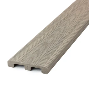 Angled image of the Deckorators Venture starter board in Saltwater, emphasizing the subtle grain pattern and straight edge profile that make it ideal for perimeter framing and stairs.