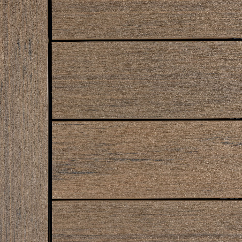 Deckorators Vista decking in Dunewood color - warm brown tones with realistic wood grain pattern, mimicking the look of natural hardwood.
