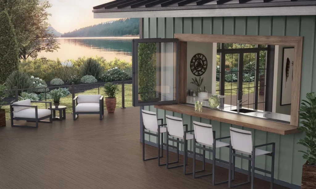 Outdoor deck overlooking a lake, built with Deckorators Vista Ironwood decking, featuring rich brown tones and natural grain pattern.
