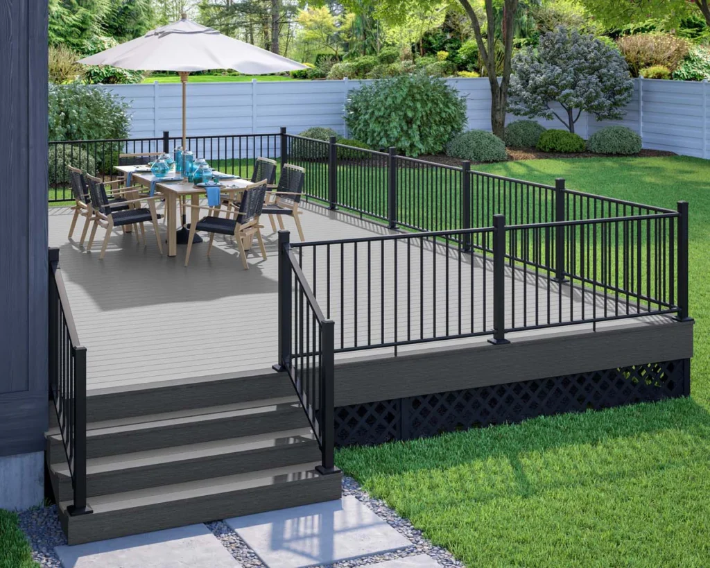 Outdoor deck built with Deckorators Vista Silverwood boards featuring a clean, modern design with black metal railing.