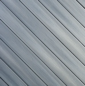 Fiberon Concordia Horizon decking in Castle Gray, displaying a smoky gray tone with dramatic multi-tonal streaking and exotic hardwood aesthetics.