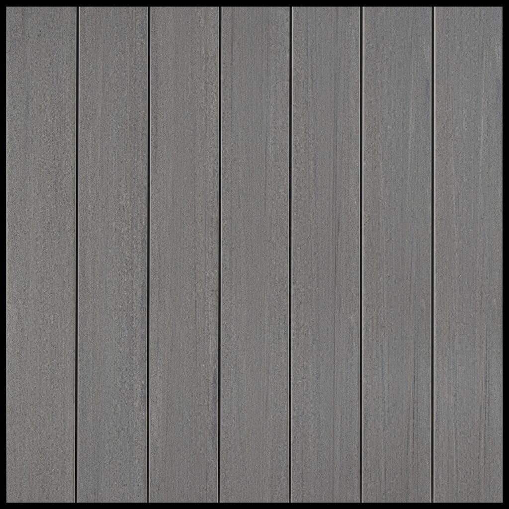 Close-up of Fiberon Promenade decking in Moonlit Cove, a soft gray tone with subtle woodgrain patterning. Designed for a cool, coastal-inspired outdoor space.