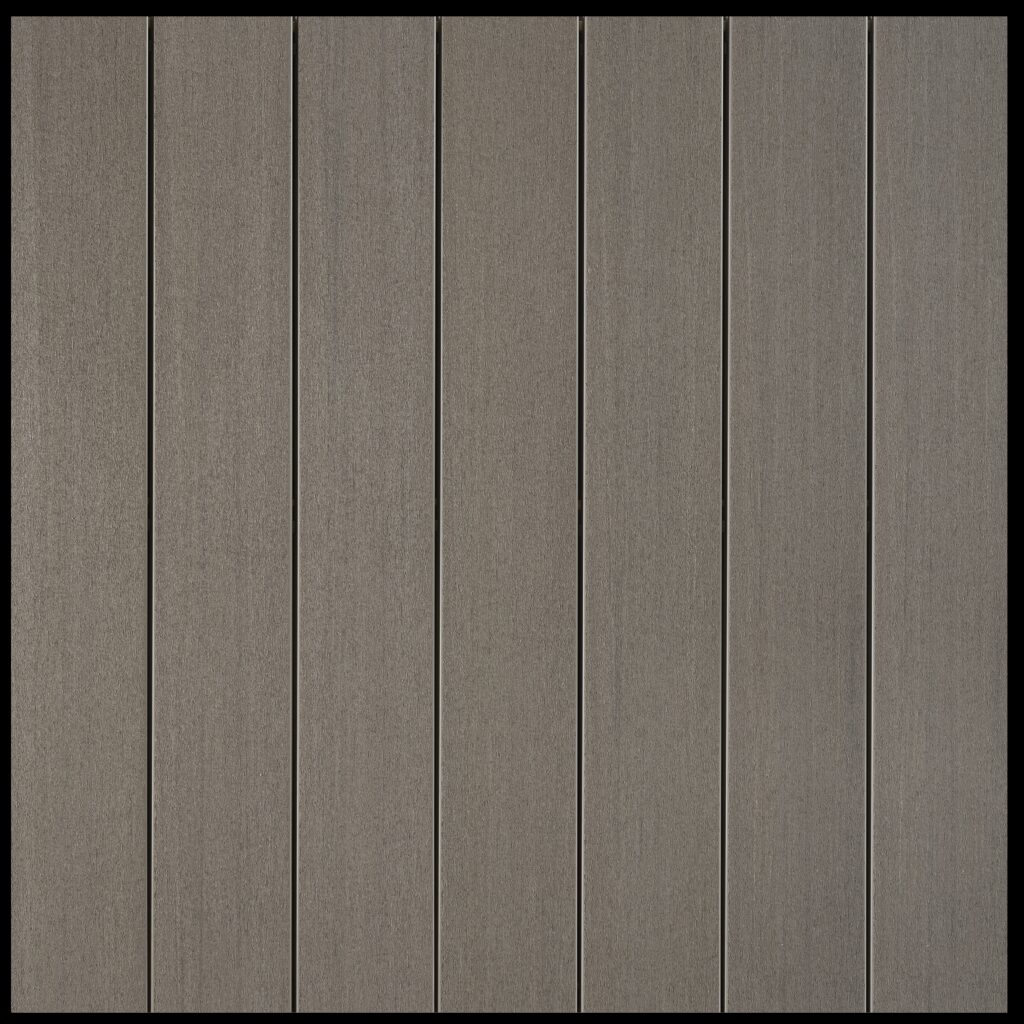 Close-up of Fiberon Promenade decking in Shaded Cay, a sleek, cool gray hue with contemporary woodgrain detail. Great for modern or coastal decks.