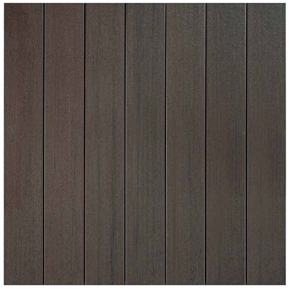 Close-up of Fiberon Promenade decking in Weathered Cliff, a neutral gray-brown color with weathered wood aesthetics. Blends easily into natural outdoor environments.