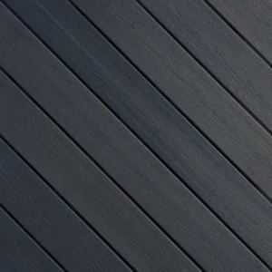 Fiberon Sanctuary decking swatch in Earl Grey, showcasing a cool mid-tone gray with natural grain detail and matte finish.
