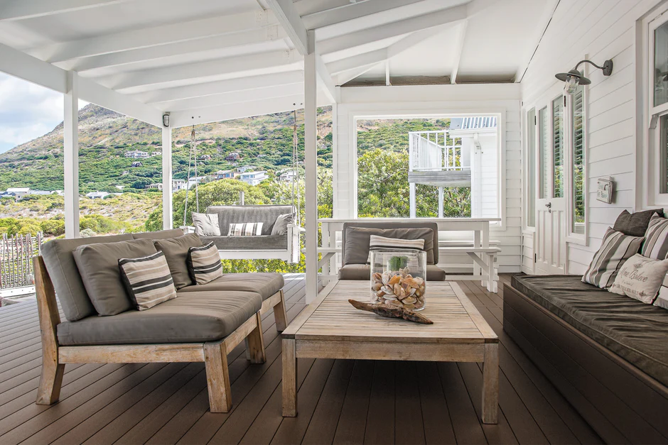 Elevated backyard deck finished in Espresso from the Sanctuary collection, styled with sleek railing and dark trim to match the rich brown tone of the boards.
