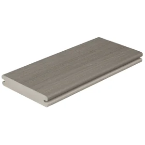Fiberon Paramount Decking in Sandstone shown as a grooved-edge board sample with a soft blend of gray and taupe tones. The smooth surface texture and neutral coloring reflect its versatility in outdoor design, offering a modern yet natural look for decking projects.