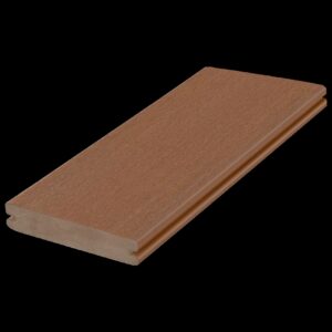 Close-up of a single grooved Fiberon Promenade Natural Reef deck board, showcasing its rich brown tone with warm undertones and a smooth, matte finish.