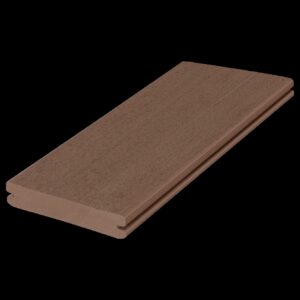 Angled product image of the Fiberon Promenade Russet Dune grooved deck board, showcasing its medium brown tone with subtle woodgrain texture and a clean grooved edge for hidden fastener installation.