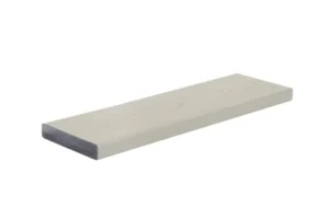 A single TimberTech Harvest+ Timber Gray square-shoulder PVC decking board is displayed against a white background. The board features a soft, cool gray tone with delicate, low-relief woodgrain patterning that resembles hand-brushed hardwood. Its edge shows the solid PVC core construction with a subtle satin-matte finish, built for long-term durability and color retention. Ideal for modern outdoor designs that need clean lines and a neutral base.