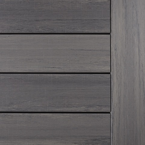 Detailed image of Castle Gate decking from TimberTech's Landmark Collection, featuring a deep gray finish with subtle variations and realistic graining.