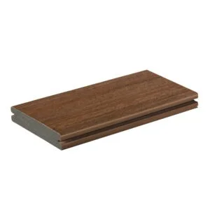 A TimberTech Vintage Mahogany grooved edge PVC decking board, designed for hidden fastener installation, with a warm mahogany tone and realistic wood texture.