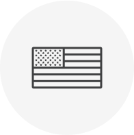 Black-and-white American flag icon inside a circle, signifying that Deckorators® Distressed Decking is proudly made in the USA, offering trusted craftsmanship and domestic quality.