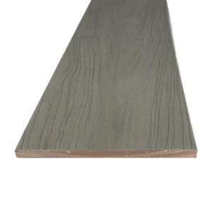 Summit fascia board in Glacier, shown from the edge to highlight its soft greige tone and woodgrain finish. Ideal for finishing vertical surfaces with a clean, modern touch.