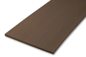 Close-up of the TimberTech Harvest Kona PVC fascia board displaying a smooth, matte brown finish with subtle wood grain detailing, ideal for skirting or deck trim applications.