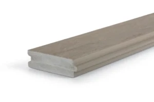 Close-up of a standard-width TimberTech Porch Coastline tongue-and-groove PVC porch board, showing the authentic wood-like surface texture and tight-fit edge profile.