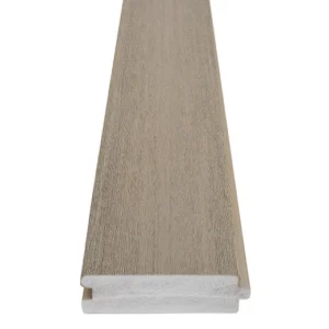 Top-down view of a wide-width TimberTech Porch Coastline board, highlighting the matte finish and slightly varied grain that mimics weathered wood for a smooth, modern appearance.