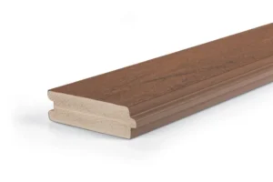 TimberTech Mahogany standard-width tongue-and-groove porch board with a rich reddish-brown finish and subtle wood grain texture. The board’s capped polymer exterior provides a durable surface that resists moisture, splintering, and fading.