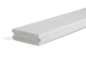 A close-up of a single TimberTech Porch in Oyster tongue-and-groove decking board shows its crisp profile and subtle woodgrain pattern. The board’s pale gray color with soft undertones adds coastal charm and coordinates with both modern and traditional home exteriors. Durable and PVC-capped, it offers superior moisture resistance and minimal upkeep.