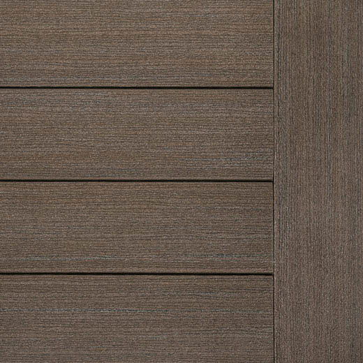 TimberTech Prime+ decking in Dark Cocoa. This swatch features deep espresso brown tones with fine linear grain detailing and subtle color variation. The horizontal boards have a rich, dark wood appearance, and the vertical edge board on the right side creates a framed contrast.