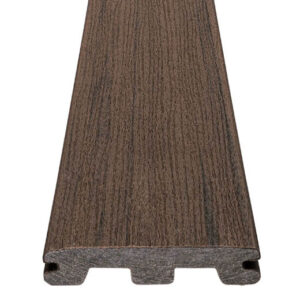 Product shot of a TimberTech Prime+ Dark Cocoa grooved-edge decking board, showing the deep chocolate brown tone and woodgrain embossing. The composite board is shown from an angled front view, revealing its grooved profile designed for hidden fasteners.