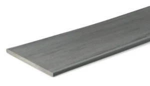 A single TimberTech Prime+ Sea Salt Gray fascia board shown from an angled side view, highlighting its soft gray hue and natural-looking straight grain pattern. The board’s scalloped edge and polymer cap give it a clean, refined look with subtle shading that mimics aged coastal wood.
