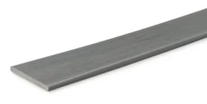A close-up angled view of a TimberTech Prime+ Sea Salt Gray riser board, displaying the refined straight grain texture and the soft, blended light gray color. The board’s scalloped profile and matte finish are visible along the edge.