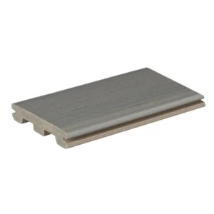 A TimberTech Prime+ Sea Salt Gray grooved-edge composite deck board with a lightly textured finish and soft gray color variation. The board’s notched edges are shown, ready for hidden fastener installation.