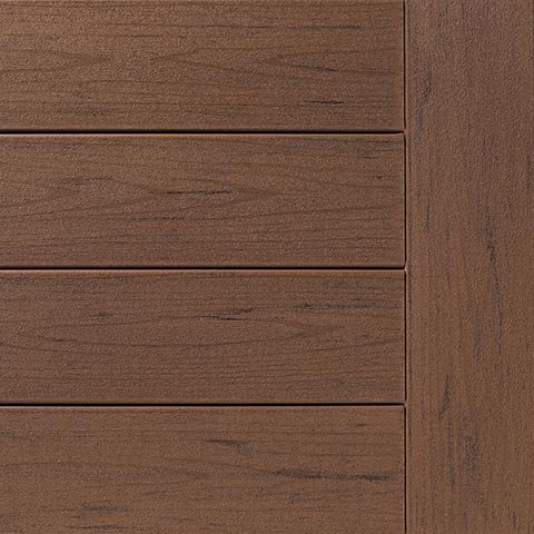 Close-up of TimberTech Terrain+ Brown Oak composite decking board swatch featuring a warm, medium brown tone with soft wood grain texture and low-gloss finish. Designed to resemble classic oak hardwood with added durability.