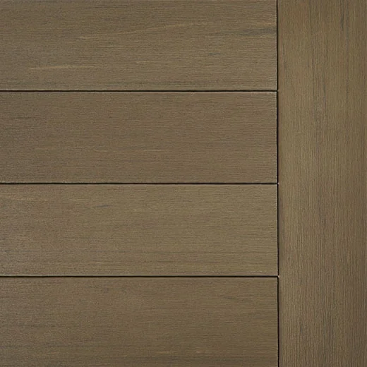 TimberTech Terrain+ composite decking swatch in Dark Oak, showing rich brown tones with subtle wood grain texture. The boards are horizontally arranged with a contrasting vertical edge board that highlights the grooved profile. The finish resembles real hardwood with a deep, sanded oak aesthetic.