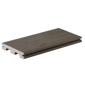 Close-up of TimberTech Terrain Silver Maple grooved-edge composite decking board, showcasing its high-performance capping and natural wood-look grain in a medium gray shade.