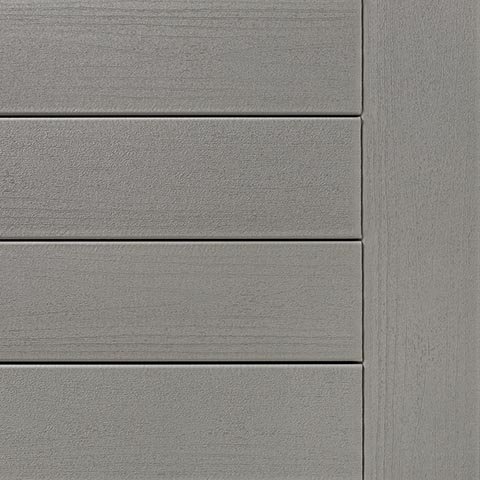 TimberTech Terrain+ swatch in Weathered Oak, highlighting a cool-toned grayish wood aesthetic with gentle grain embossing. The decking boards are shown in horizontal alignment with a vertical edge board to the right. The matte finish creates a worn, sun-faded oak appearance perfect for neutral, rustic settings.