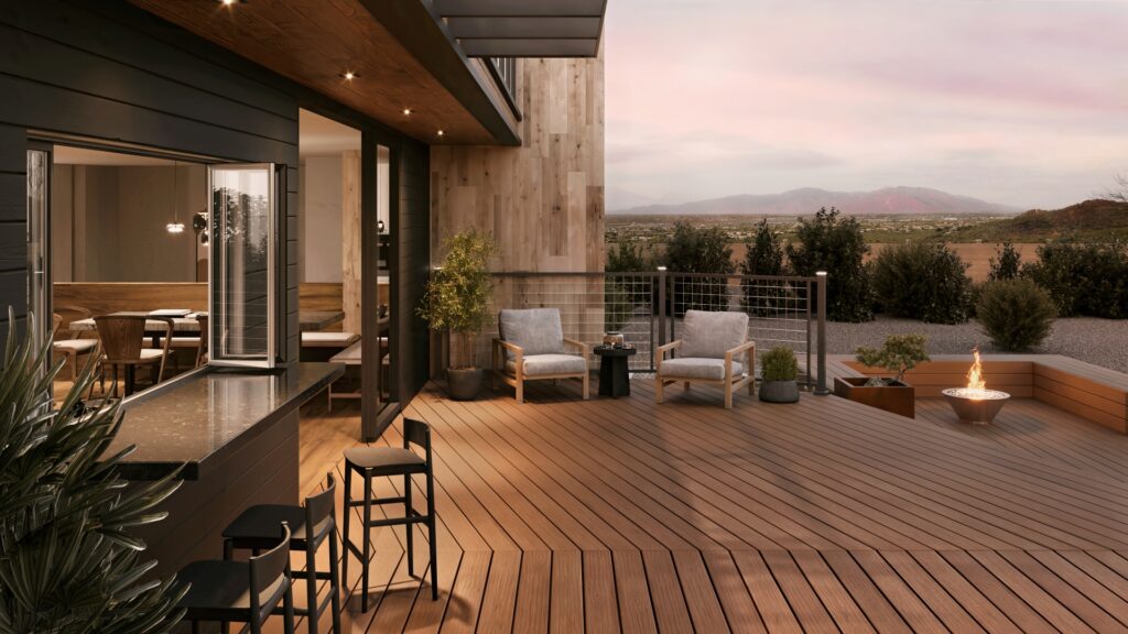 Upper deck entertainment space featuring Trex Signature Ocracoke decking and sunset views.