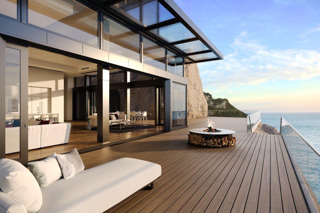 Luxurious oceanfront deck with panoramic views and Trex Signature Ocracoke decking.