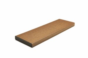 Trex Signature Ocracoke 1-inch square edge decking board in warm, coastal brown with classic edge profile and high-performance shell.